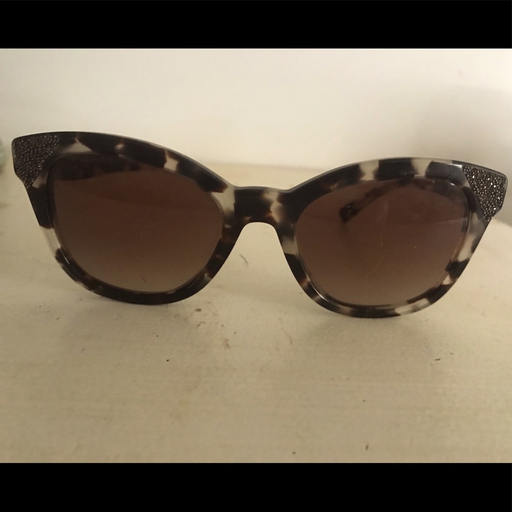 Valentino sunglasses. In gently used condition with case.